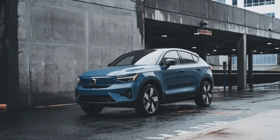 Blue Volvo SUV parked in a modern urban environment showcasing sleek design and urban lifestyle
