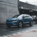 Blue Volvo SUV parked in a modern urban environment showcasing sleek design and urban lifestyle