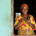 a happy elderly african woman