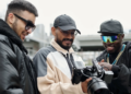 assessing camera footage with colleagues