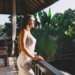 calm woman standing on terrace