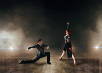 elegant dancers pair dancing on stage