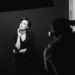 woman posing in studio for male