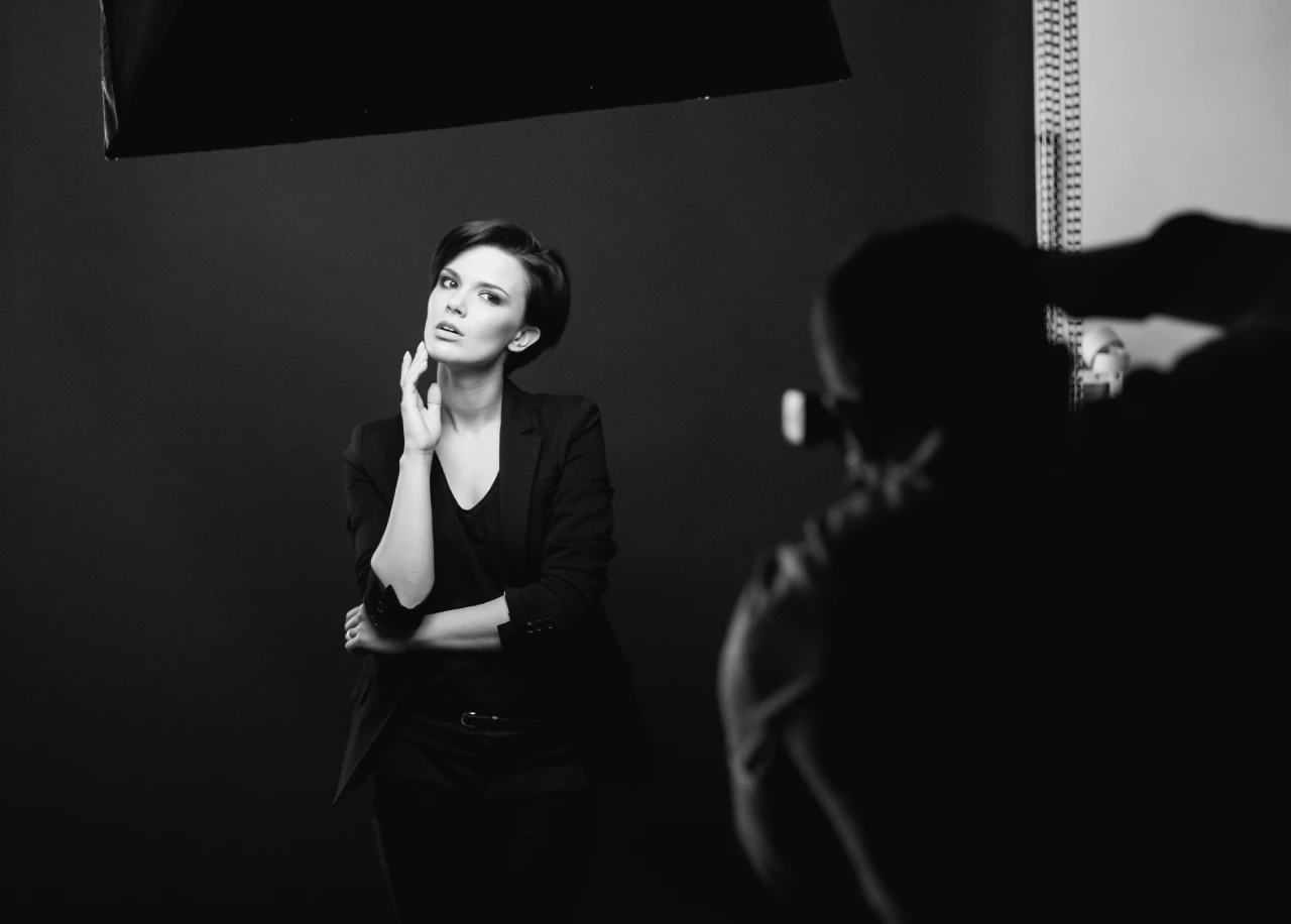 woman posing in studio for male