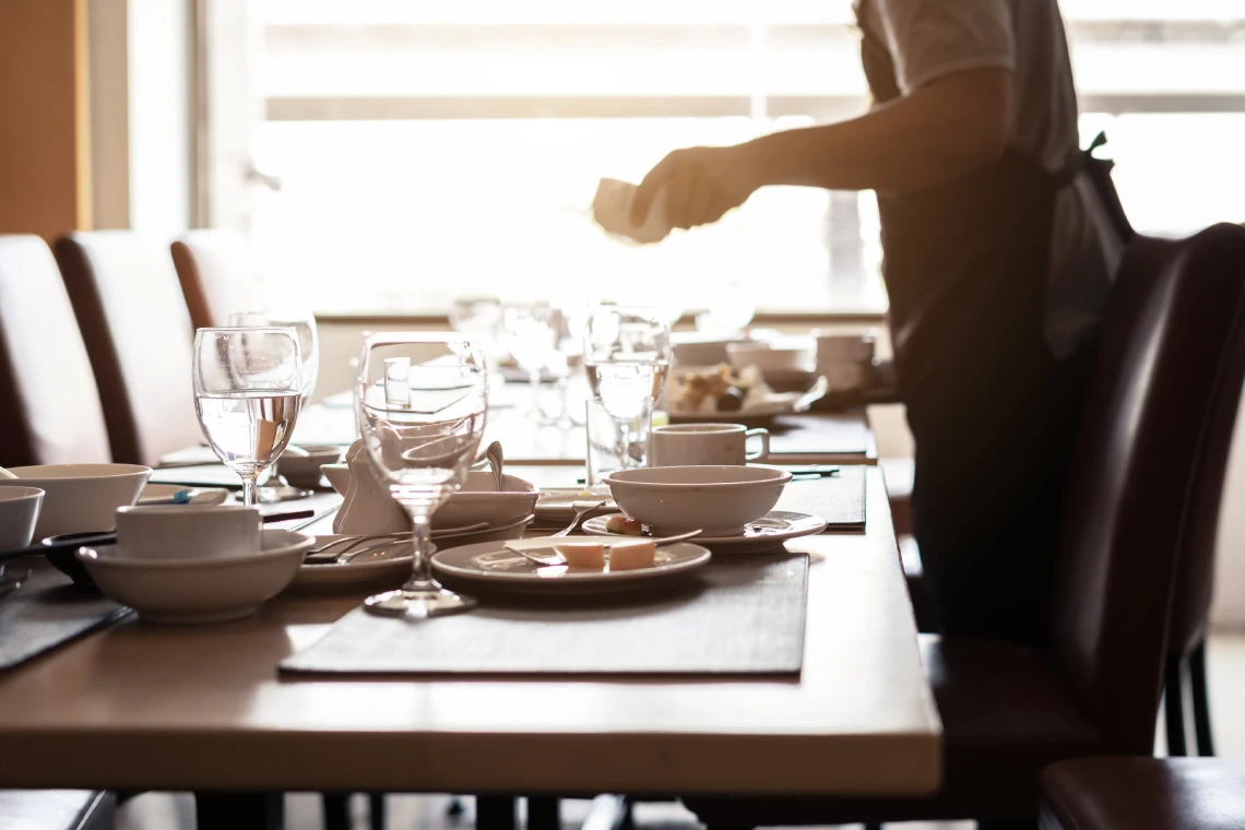 empty dirty glasses and plates on dinning
